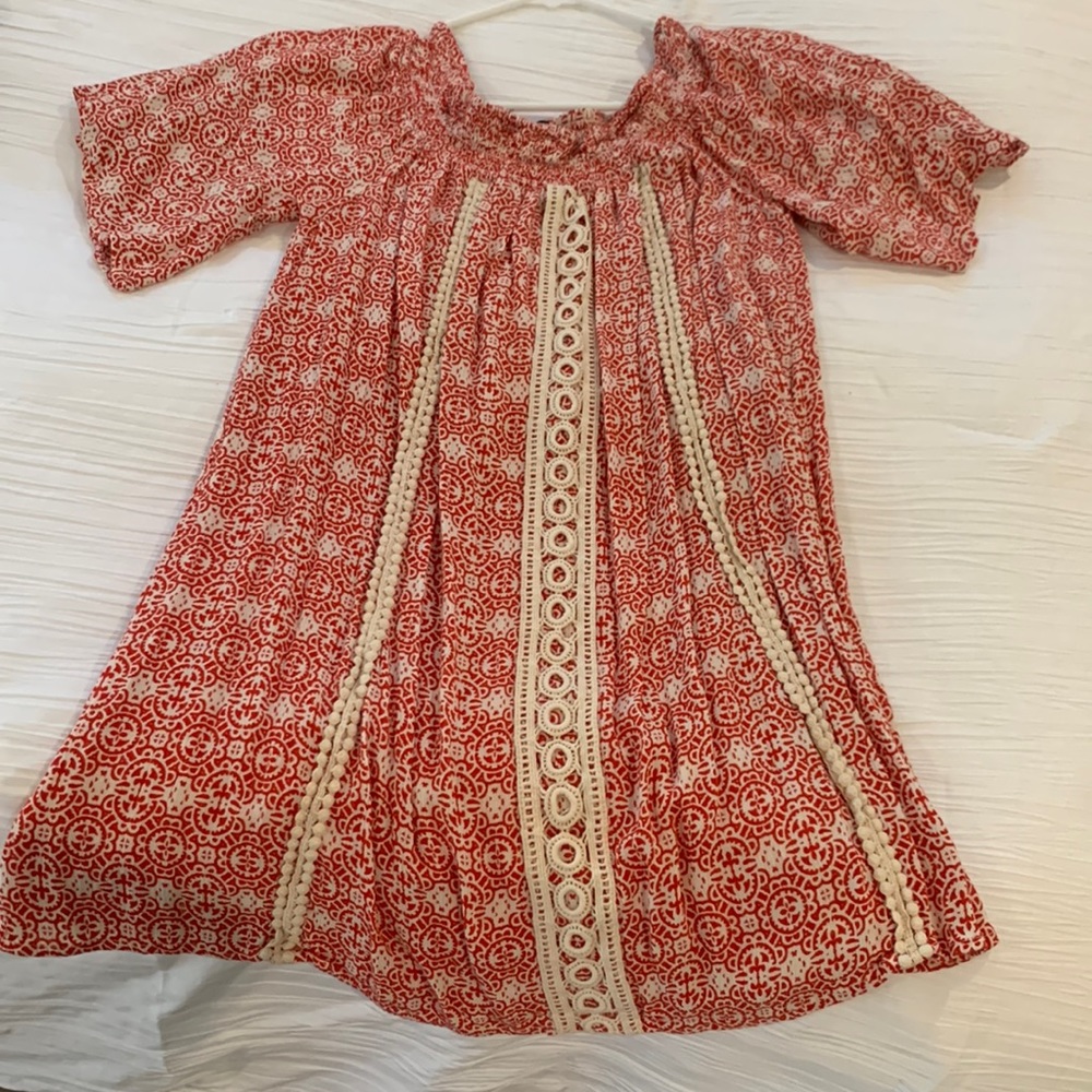 Red and cream dress